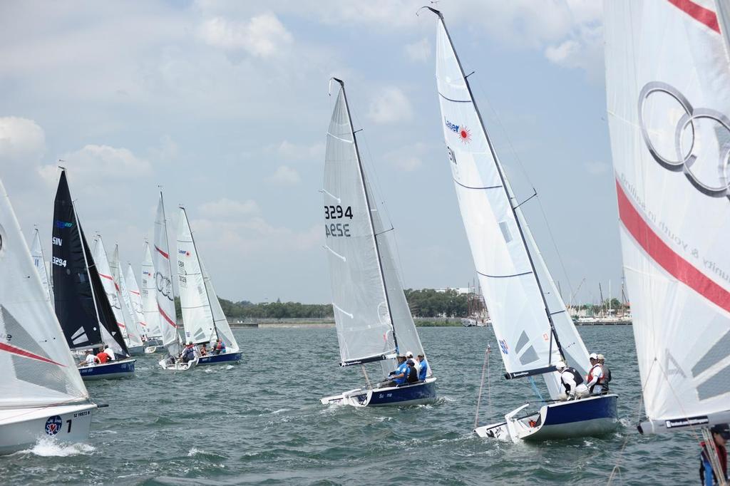 SB20s from all over the world crossing the starting line on Day 3 racing last year © Liu Yuhong